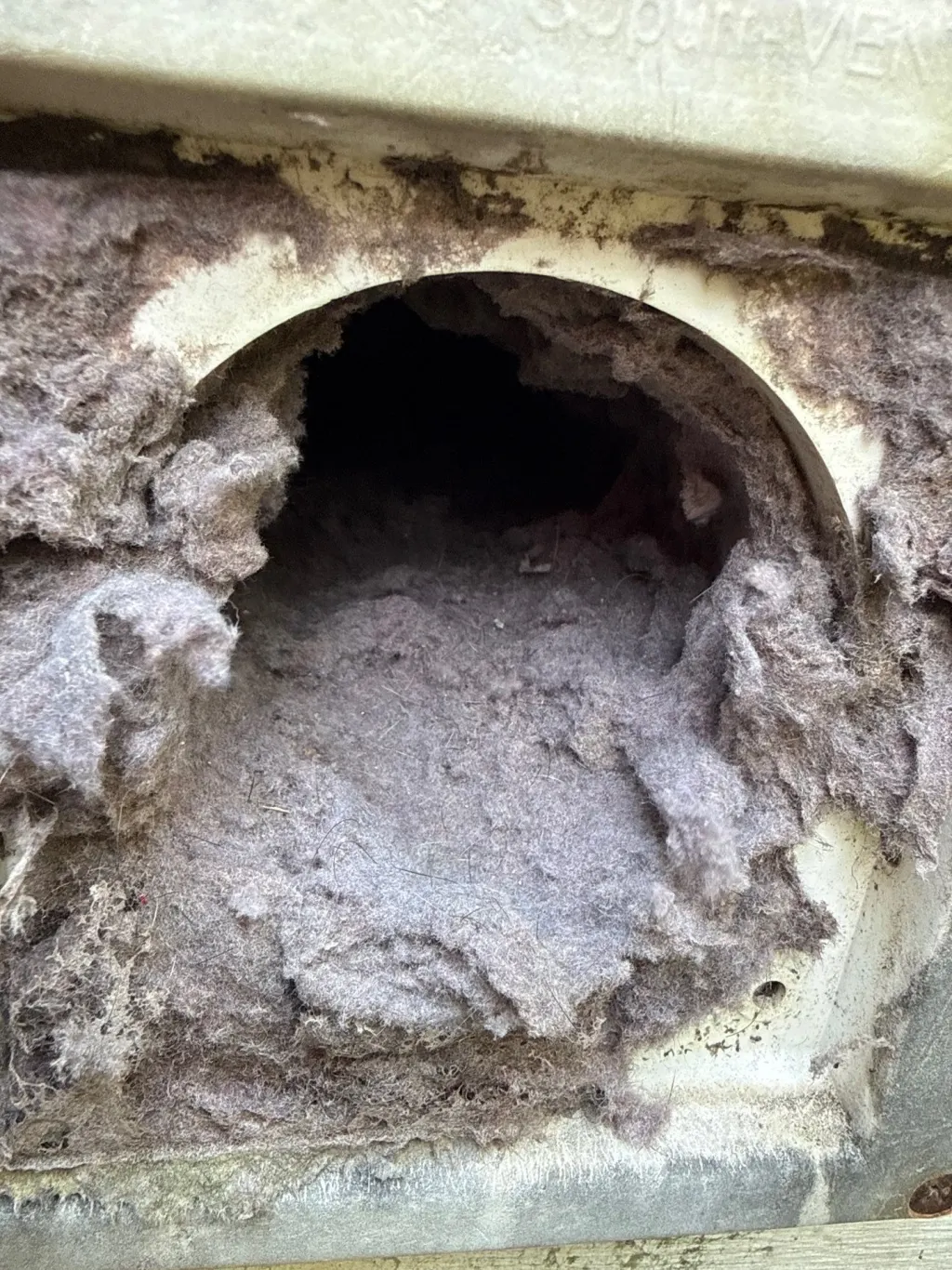 Inside a customer's ductwork before Superior's cleaning — job 2