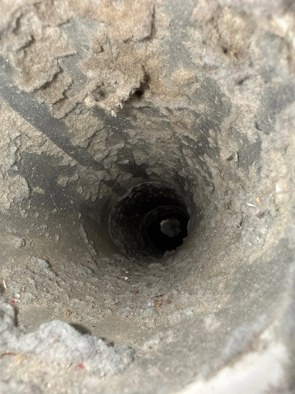 Inside a customer's ductwork before Superior's cleaning — job 3