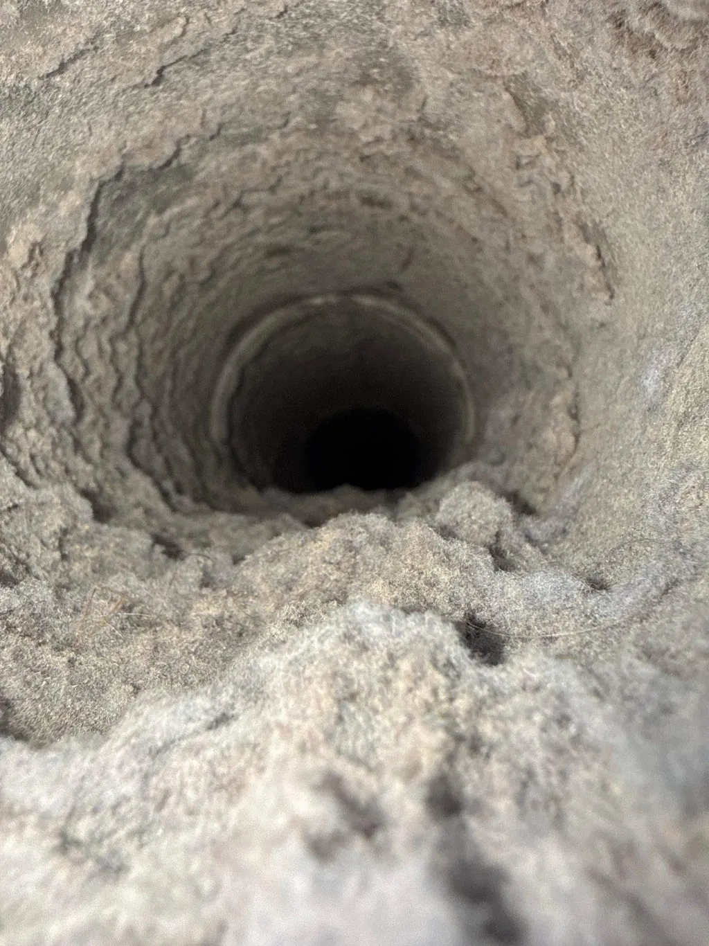 Inside a customer's ductwork before Superior's cleaning — job 7