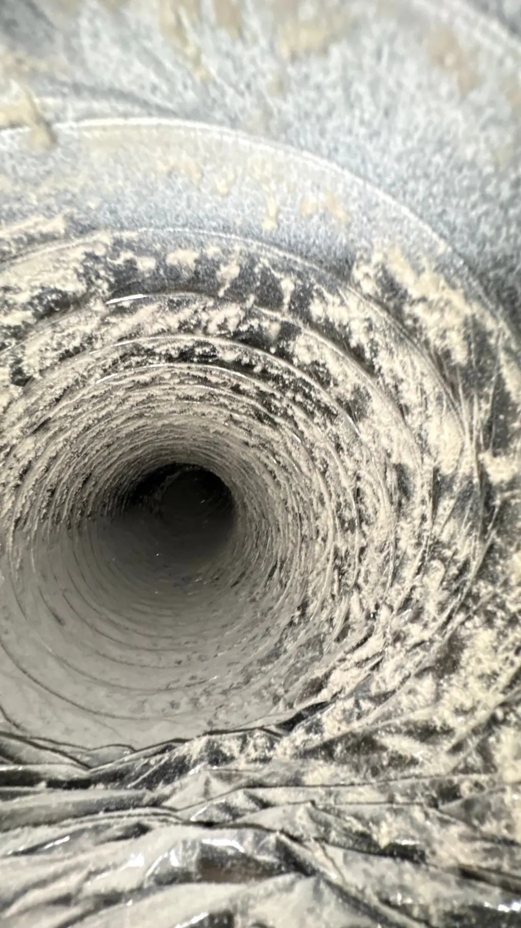 Inside a customer's ductwork before Superior's cleaning — job 14