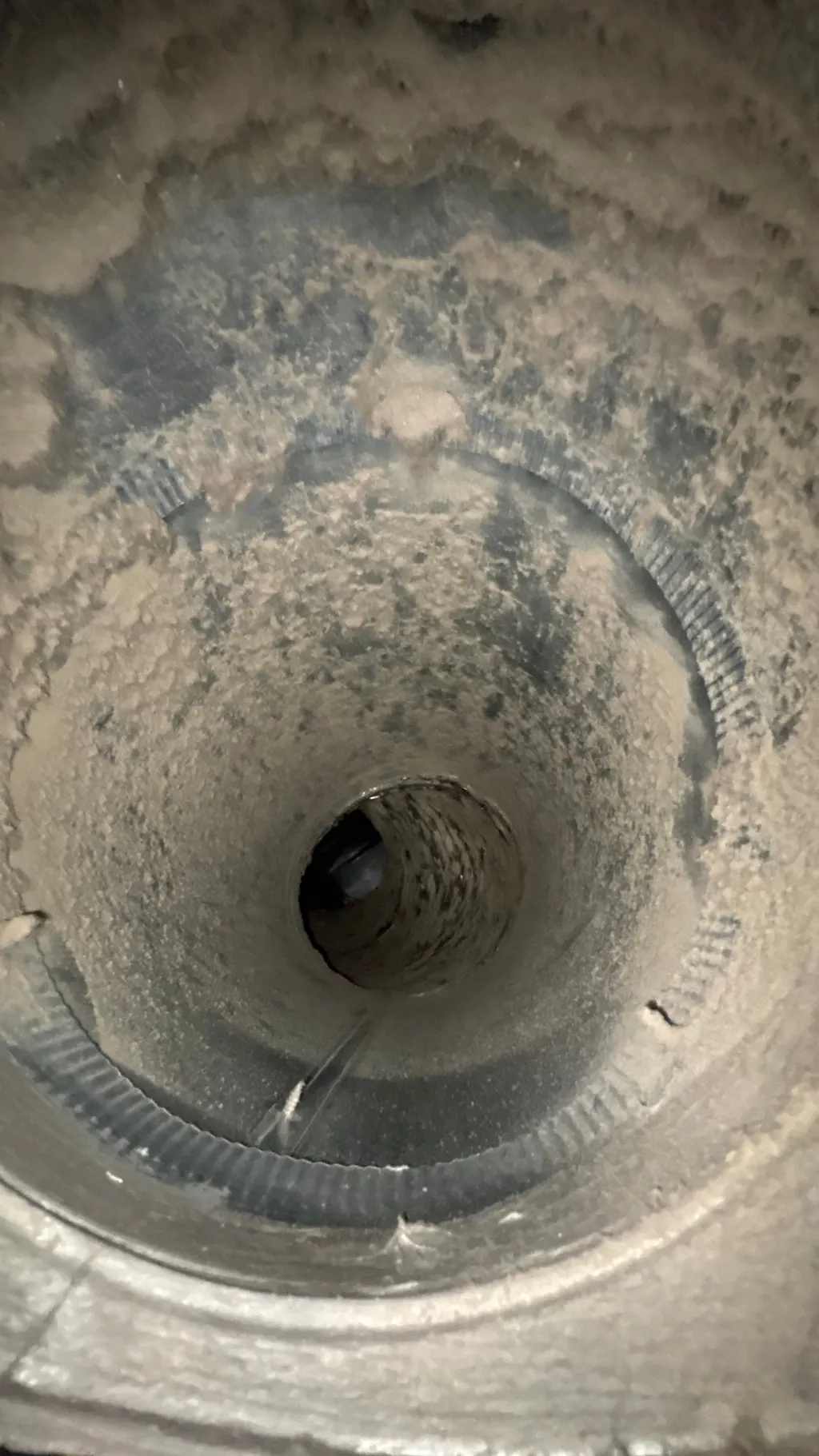 Inside a customer's ductwork before Superior's cleaning — job 15