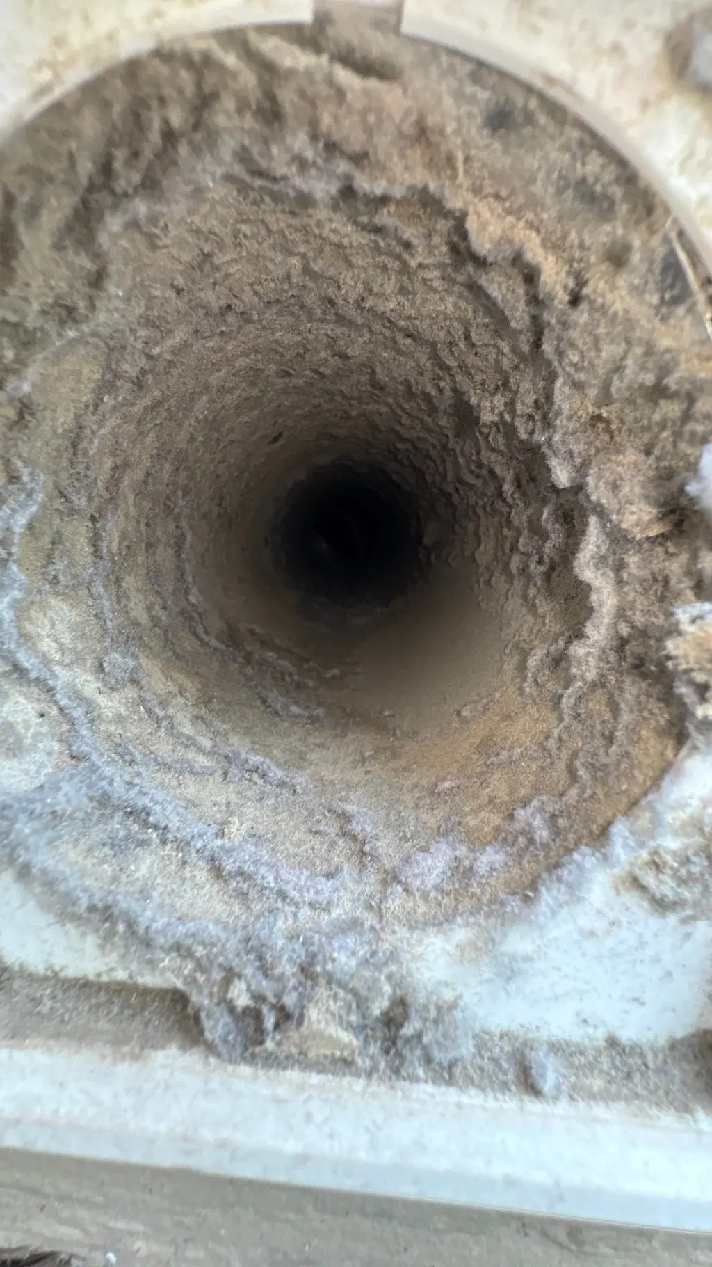 Inside a customer's ductwork before Superior's cleaning — job 21