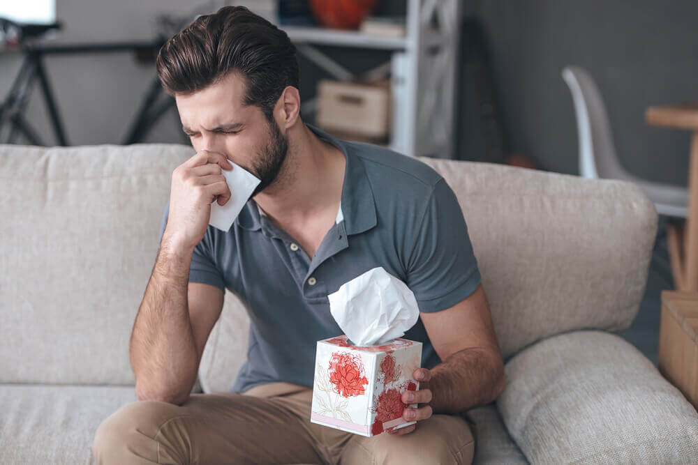 Man frustrated by allergies