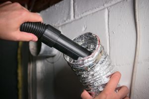 Air duct being cleaned